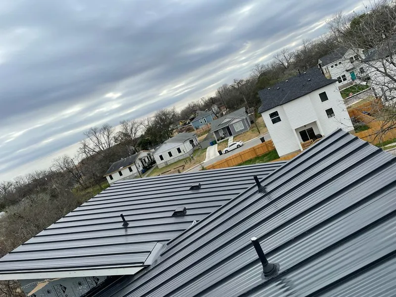 Standing seam metal roof panels with vents for Skylight Repair in Stillwater